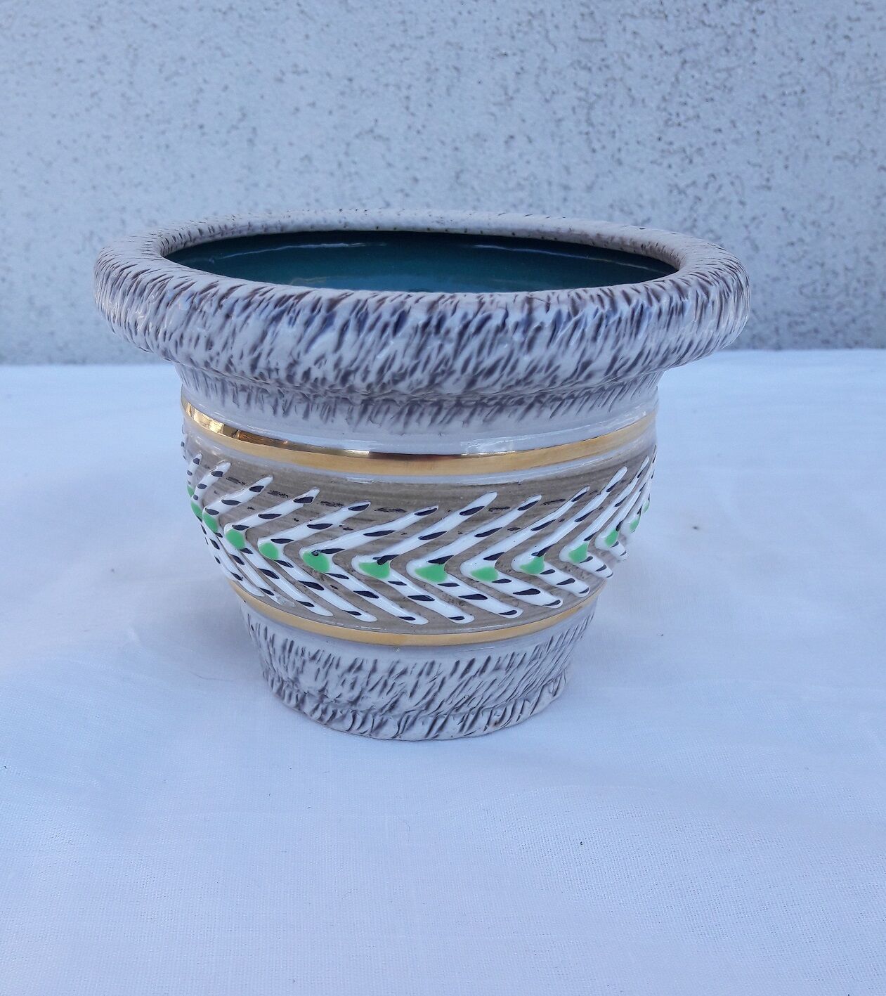 Signed sandstone pot cover