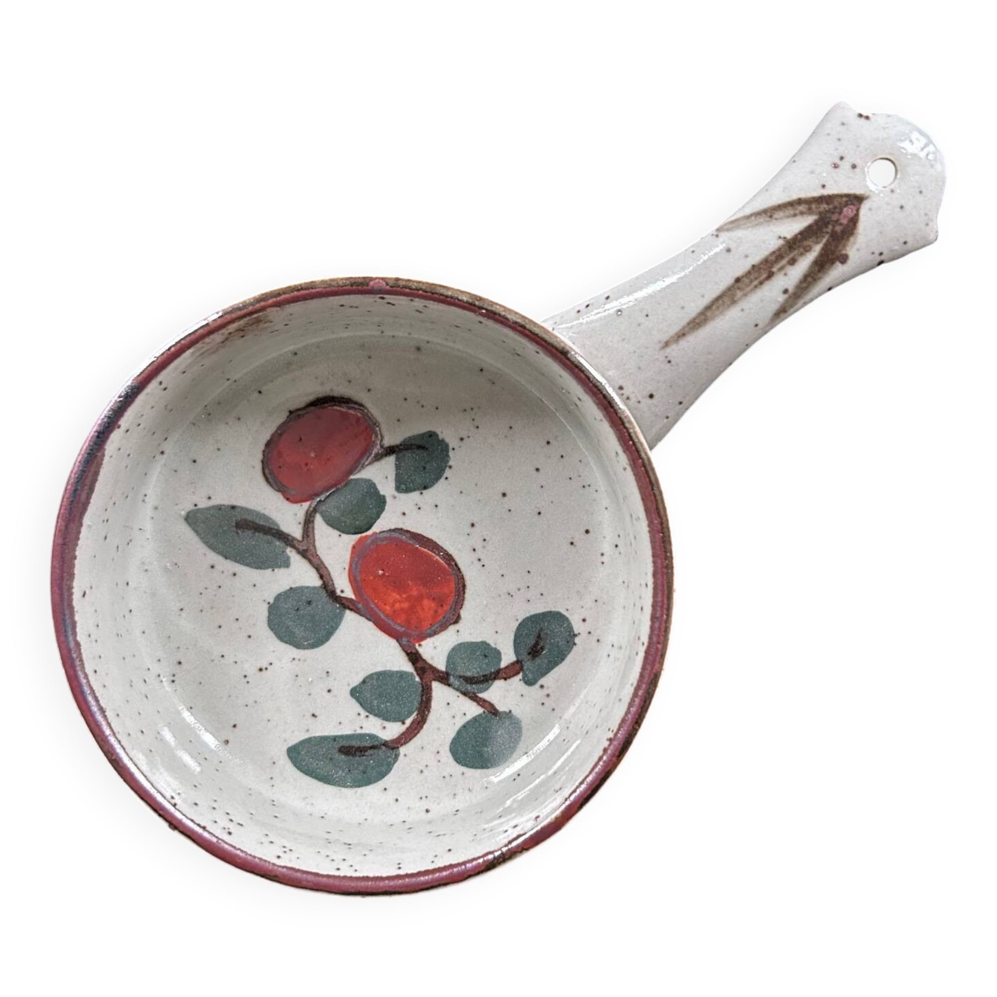 Frying pan with red fruit decoration