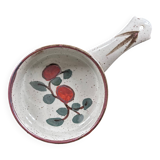 Frying pan with red fruit decoration