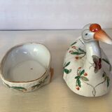 Large bird pocket emptier with butterflies and flowers.