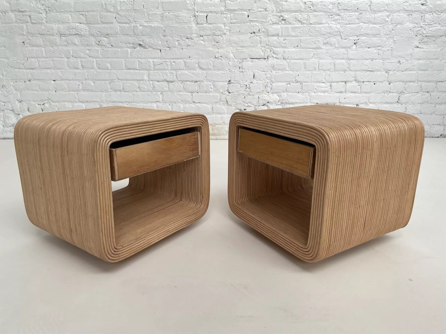 Pair of rattan bedside tables