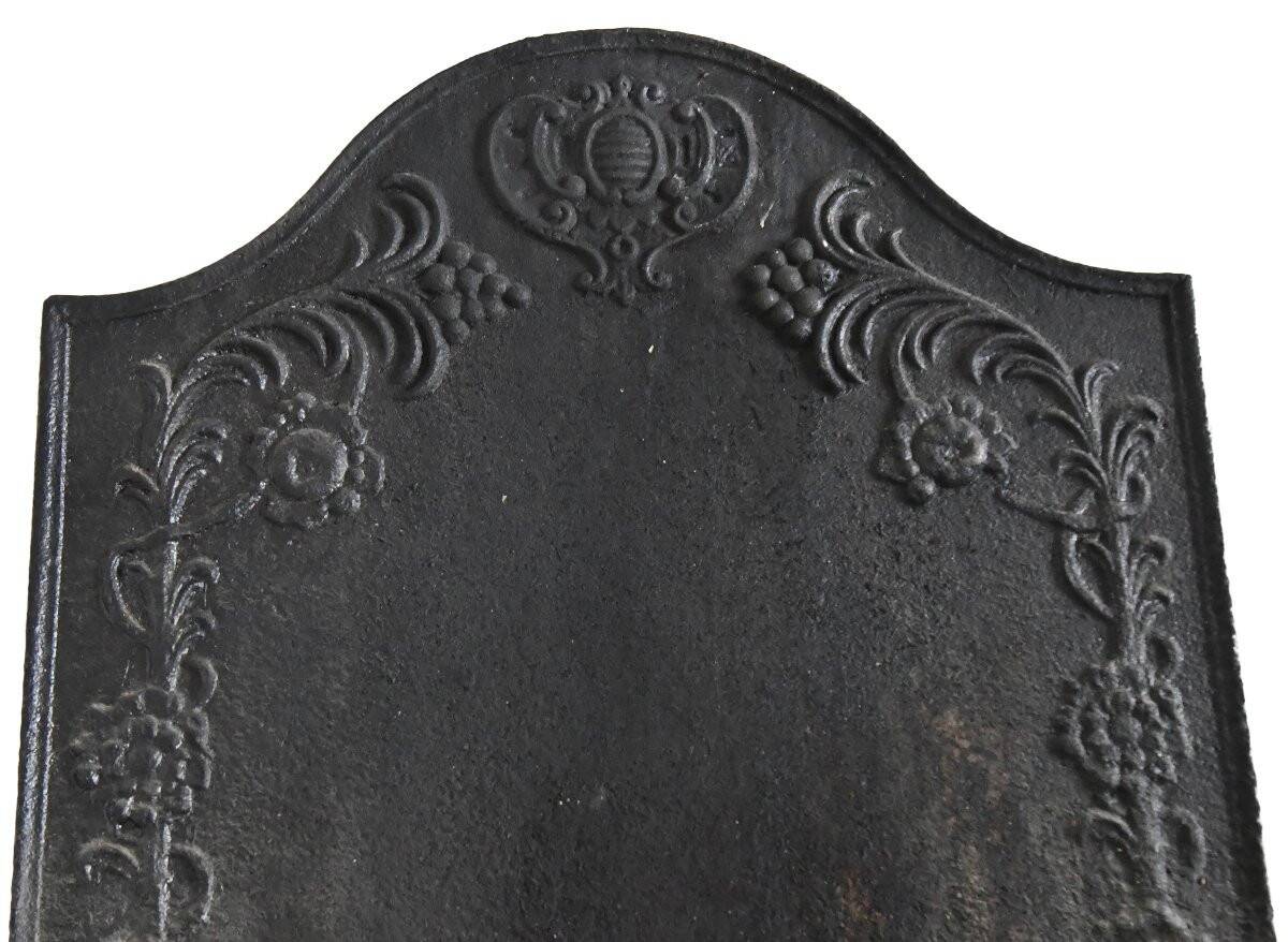 Old cast iron fireplace plaque