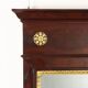 Antique Empire fireplace mirror in mahogany with a bronze frame, Italy, 19th century.