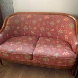 Art Deco style sofa, covered in Indian fabric with a pink background