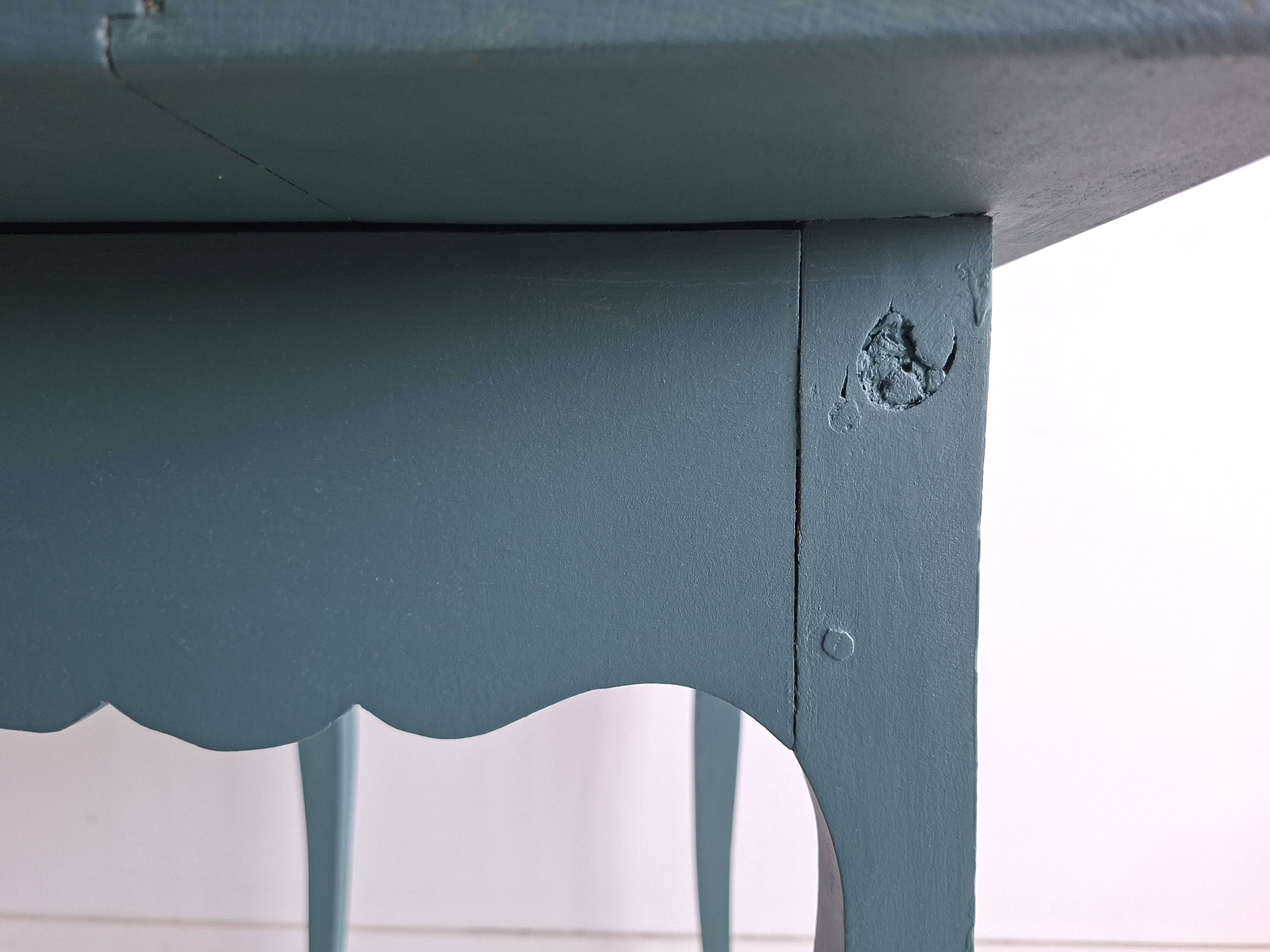 Antique Gustavian-style table painted in dark green with a drawer.