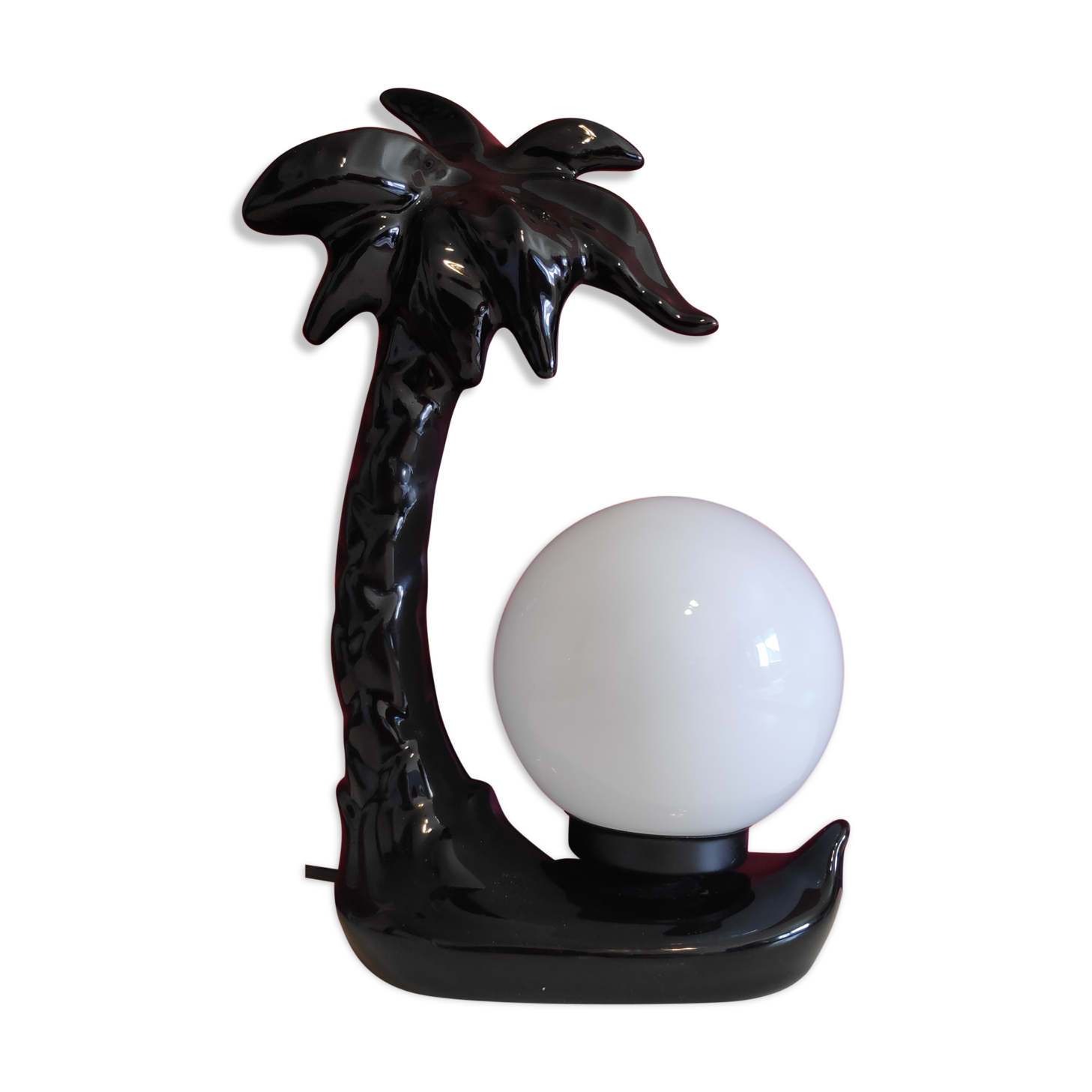 Black ceramic palm lamp and white opaline globe