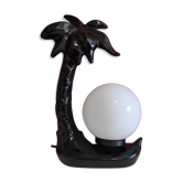Black ceramic palm lamp and white opaline globe