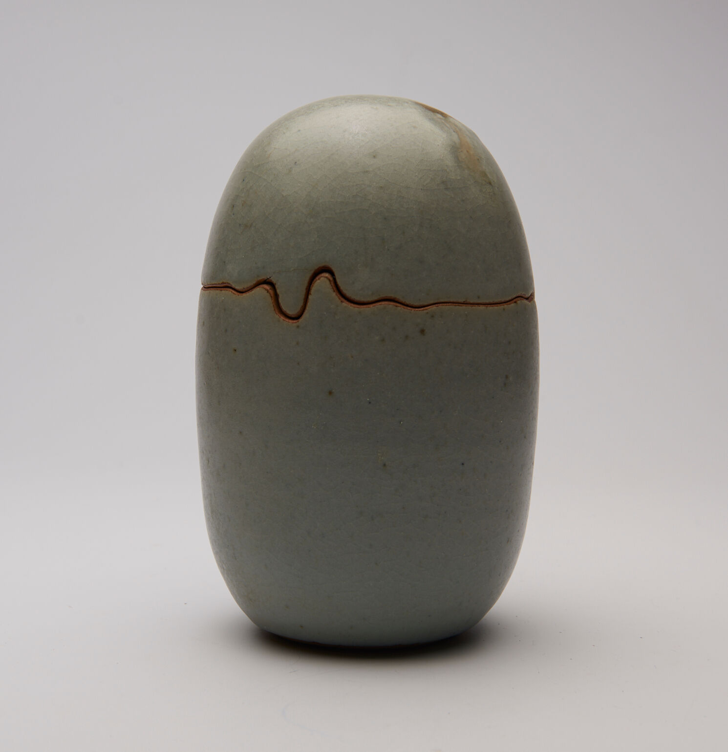 ovoid box in stoneware and cracked celadon varnish