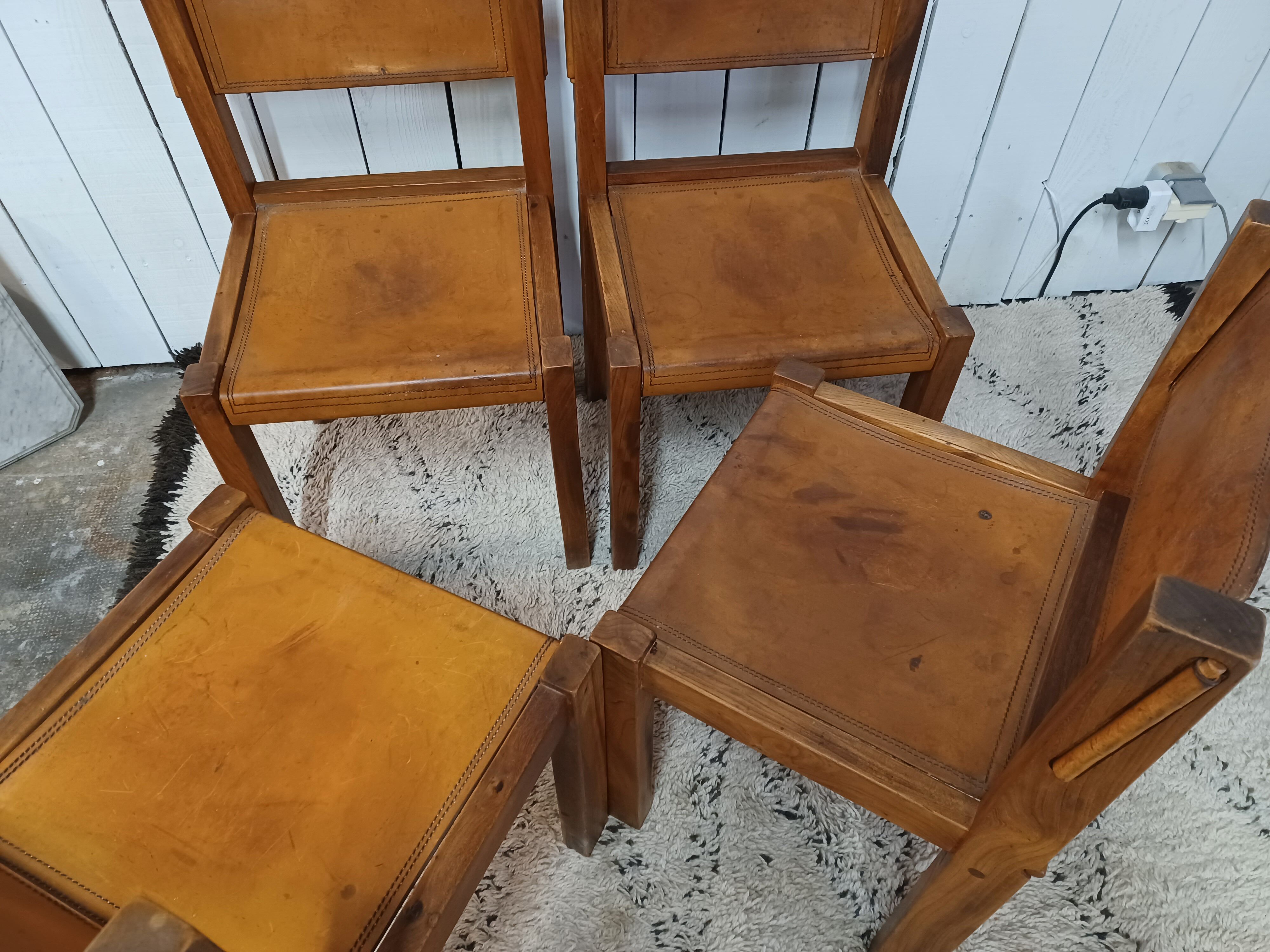 4 elm and leather chairs 1950