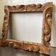 Antique handcarved frame   solid wood 33.5  x 29 cm  opening measurements 23.5 cm x 19 cm cedar wood