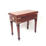 Small old side table with brass finishes