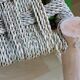 Lemon tree wood bench and braided palm leaf