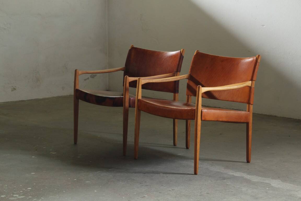 Pair of vintage Per-Olof Scotte "Premier 69" oak armchairs in cognac leather