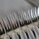 12 Christofle Versailles model cake forks in silver-plated metal.