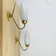 Pair of opaline brass wall lights from the 50s, Arlus, Lunel