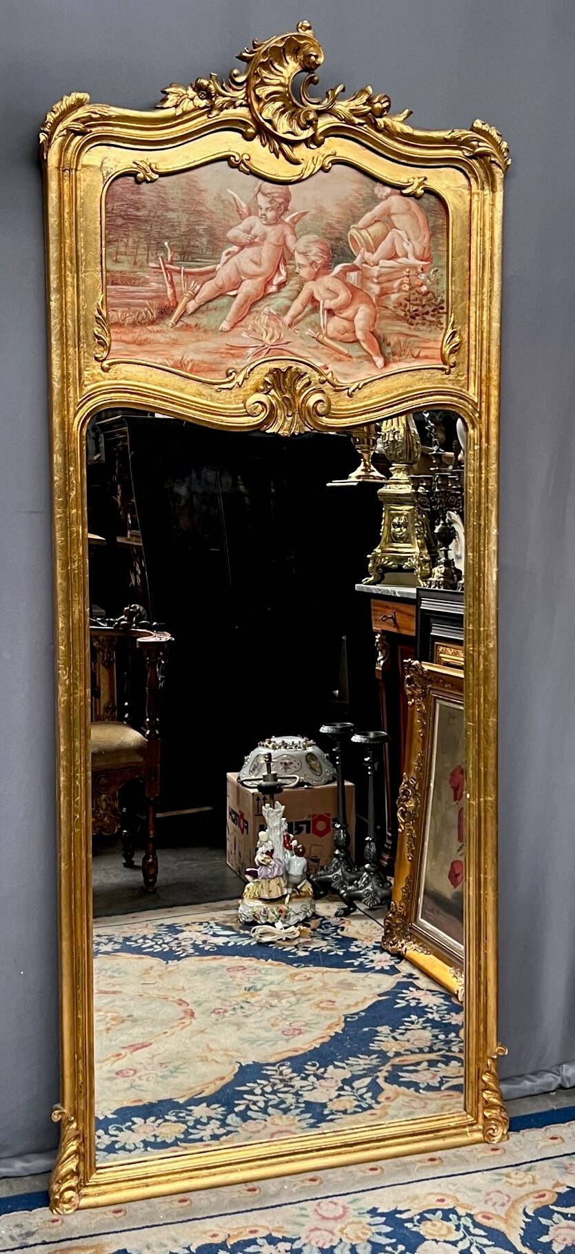 Antique Rococo mirror with cherubs