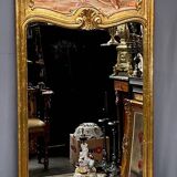 Antique rococo mirror with cupids