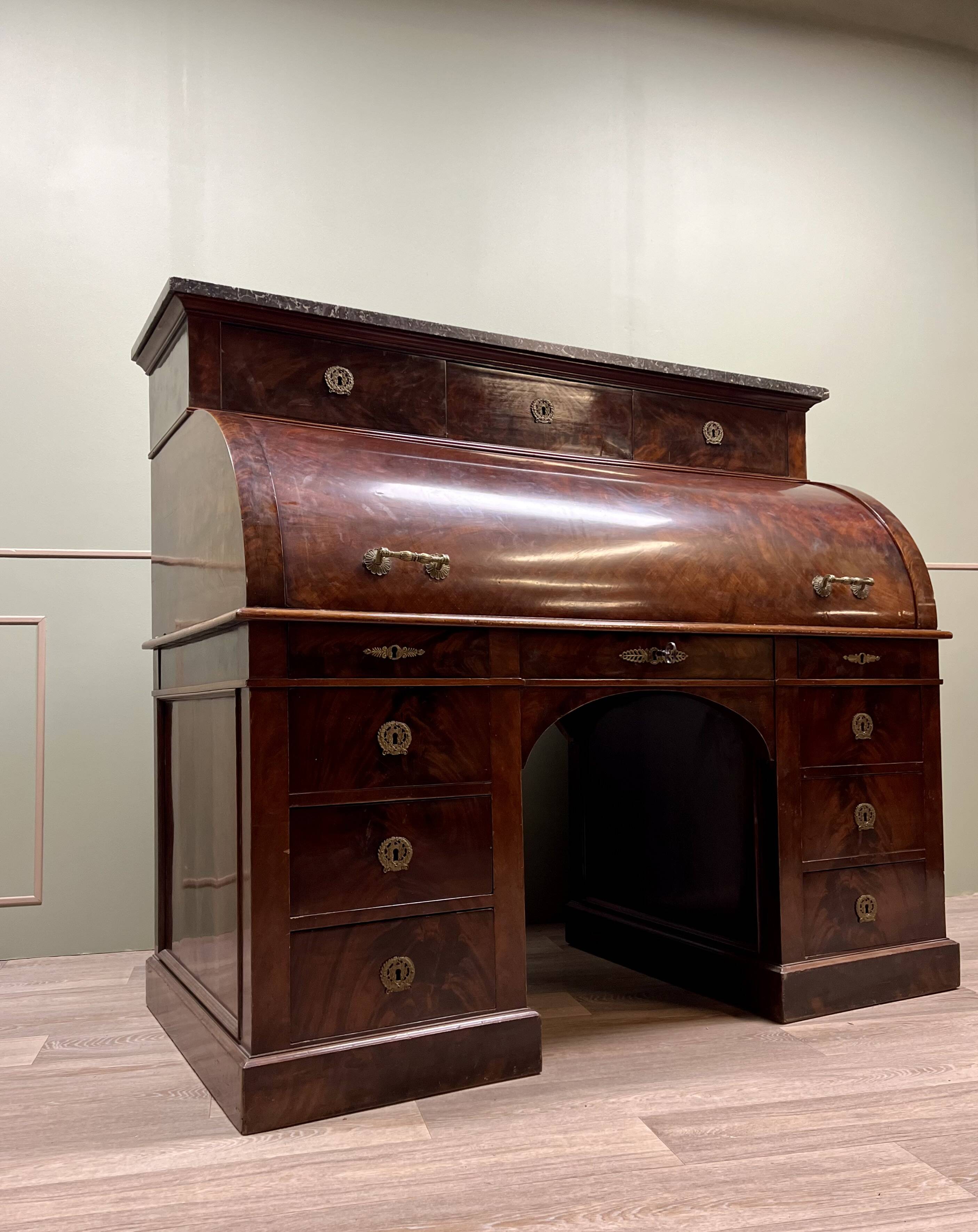 Cylinder desk in flamed mahogany empire style 19th century