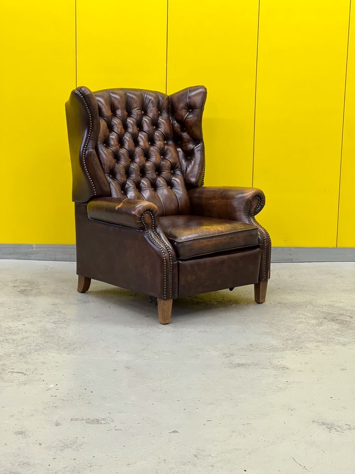 Brown vintage handmade chesterfield recliner armchair