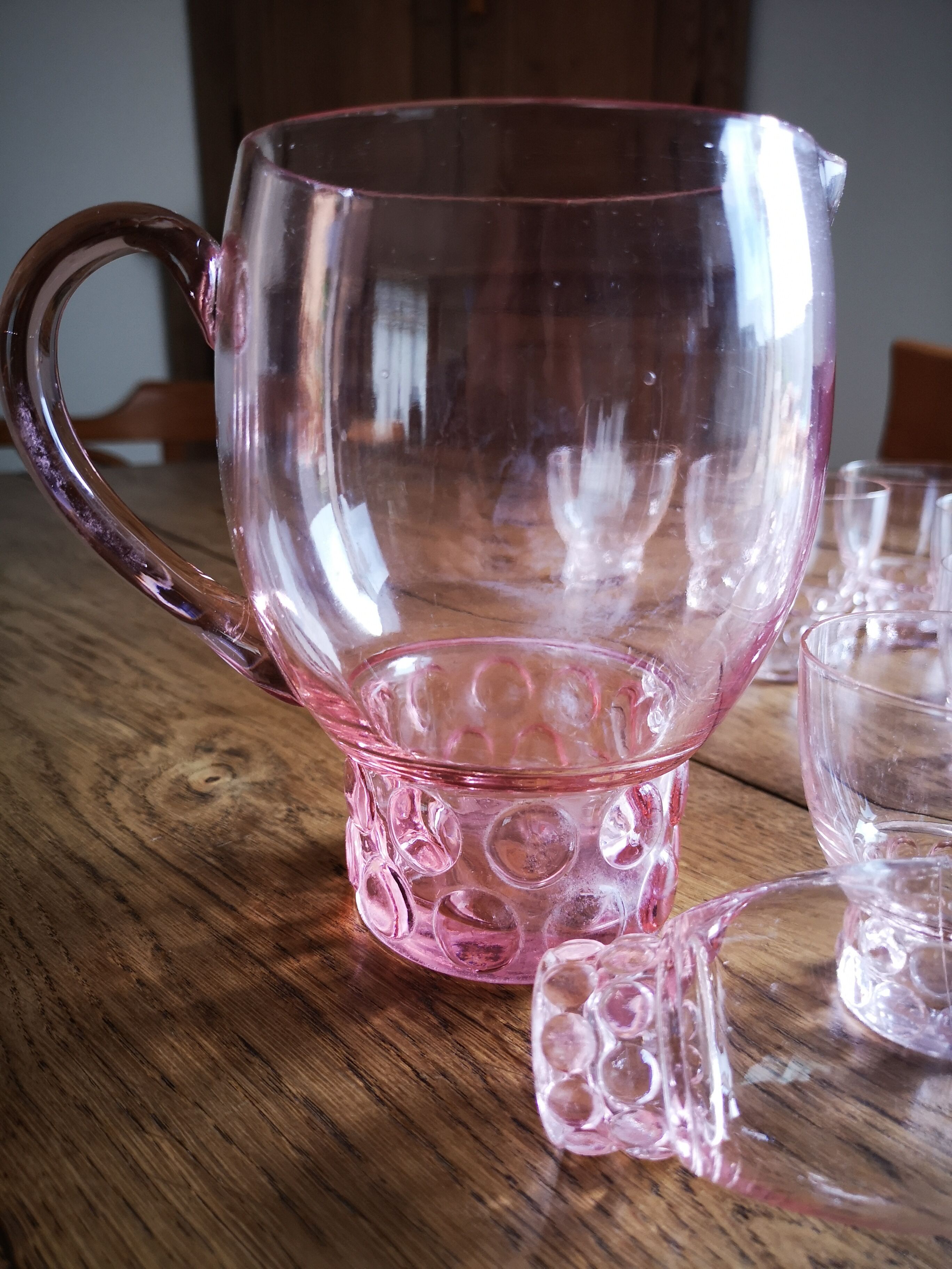 Carafe and water glasses and liqueur