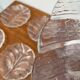 Vintage Swedish glass plates Eden by Lars Hellsten for Orrefors, 1970s, set of 13.