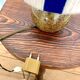 Vintage table lamp with pyrite sandstone base and striped wool lampshade