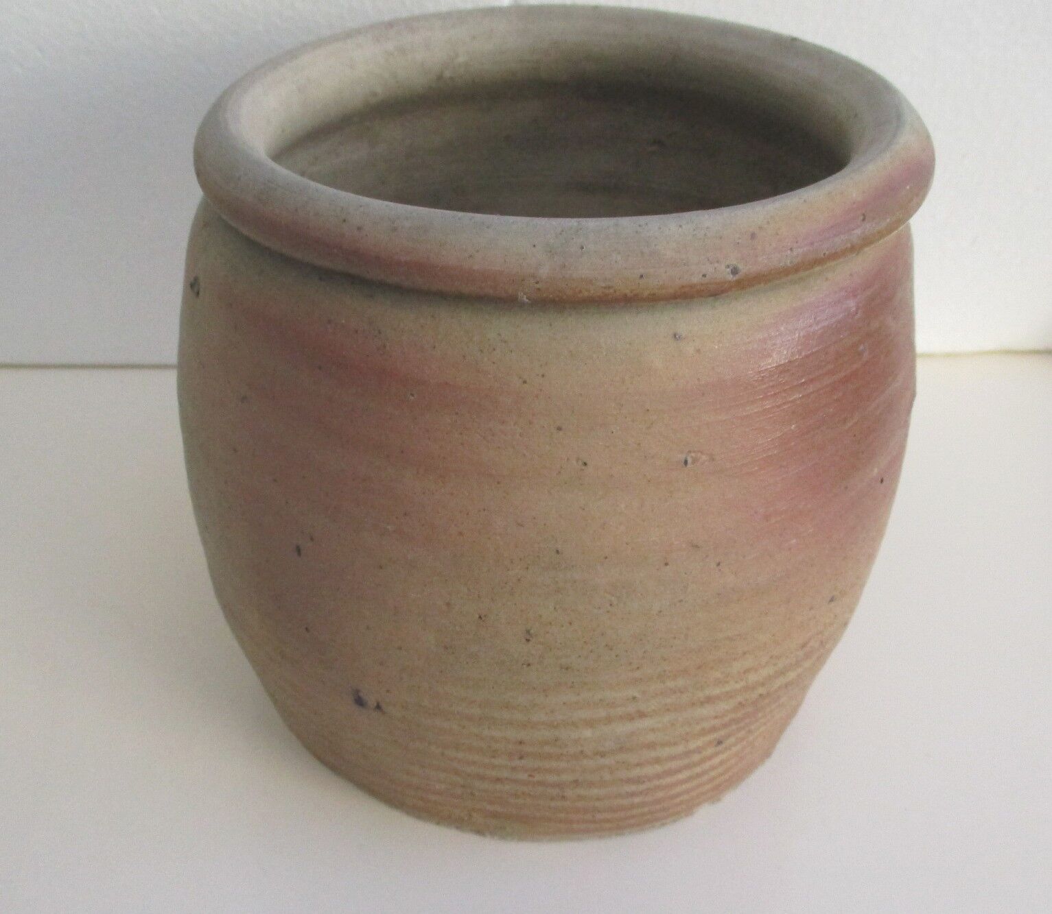Ancient sandstone pot at one handle