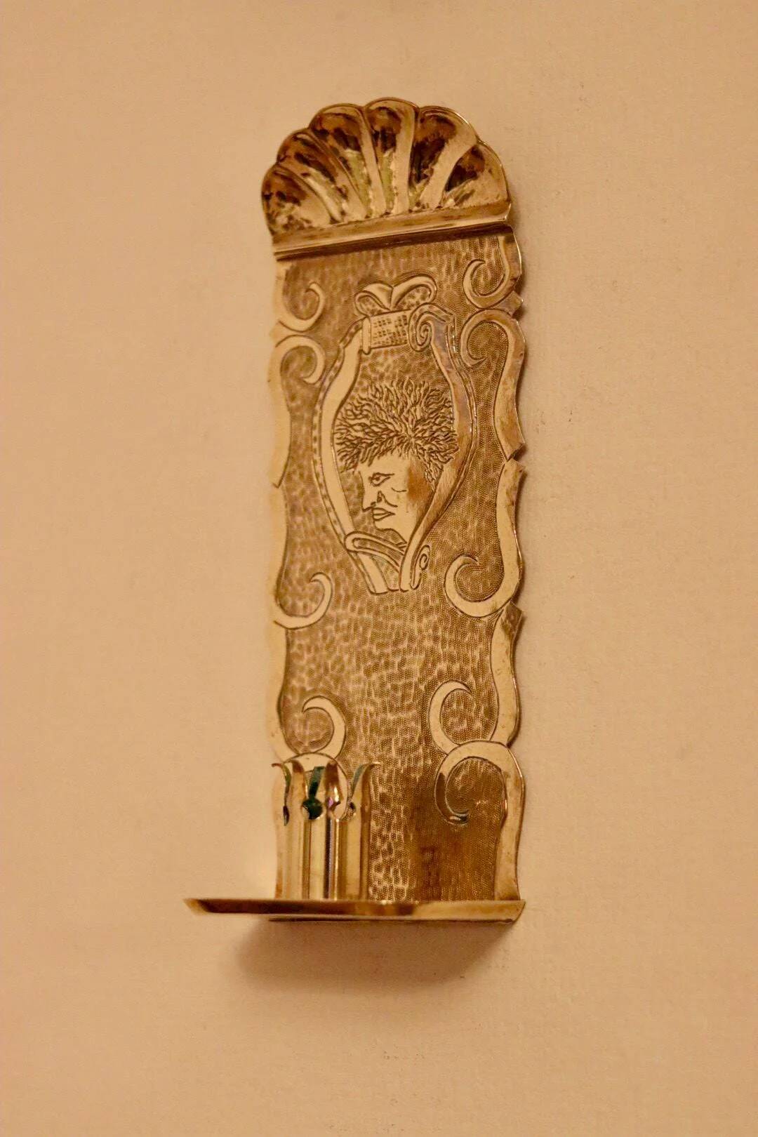 A pair of Swedish brass wall sconces from the mid-century.