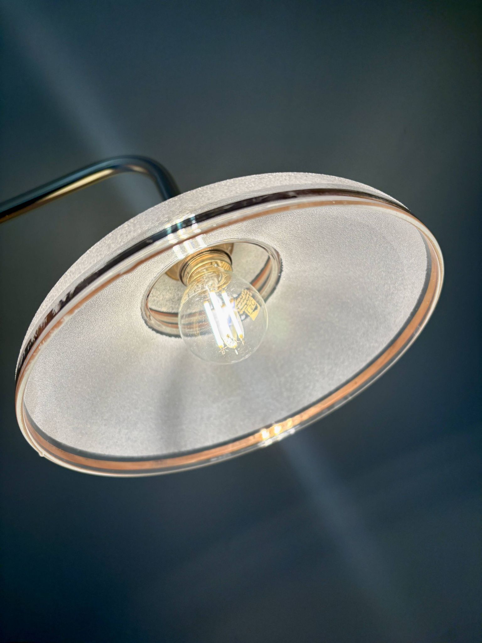 Vintage elbow wall lamp with white and gold granite glass shade