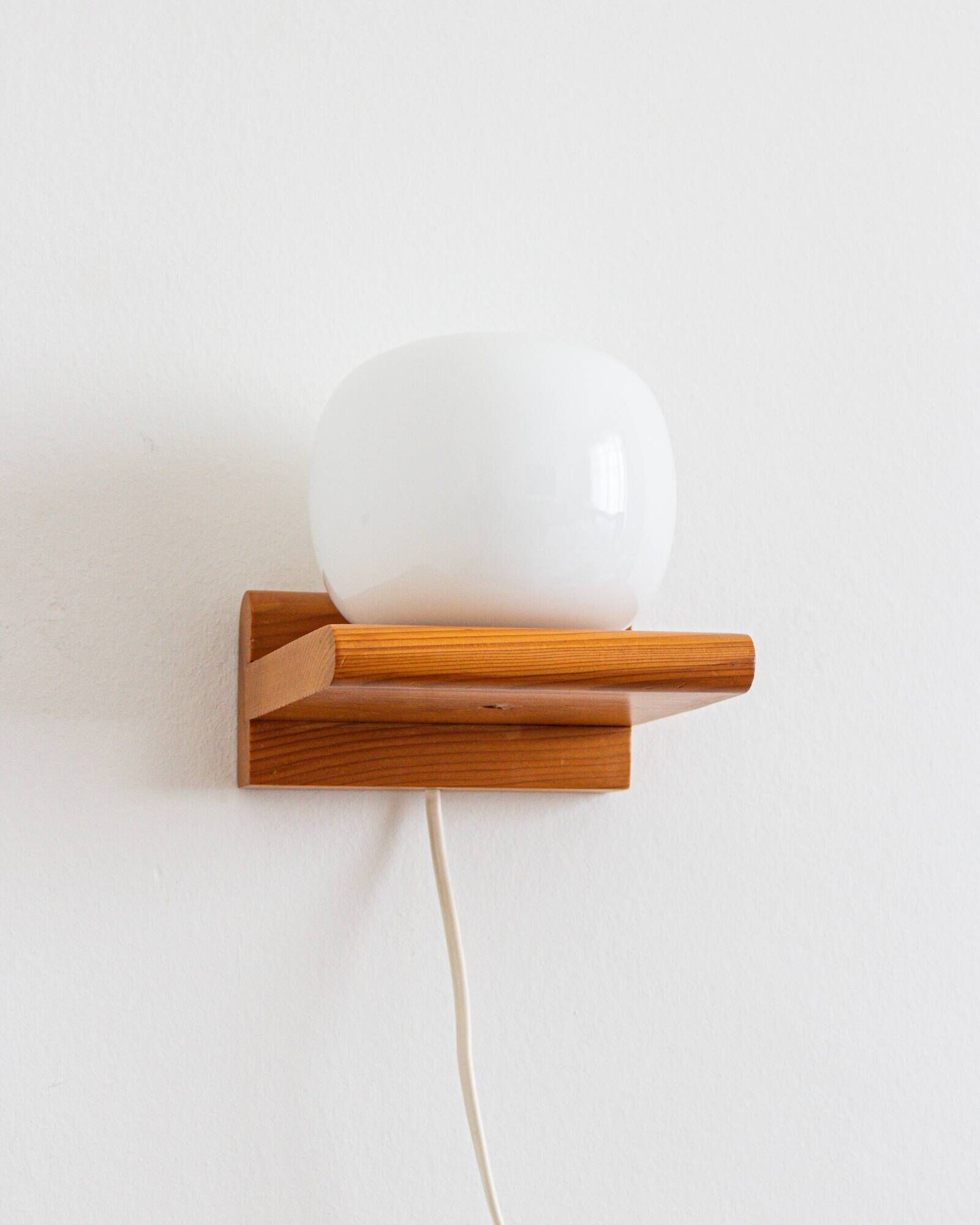 Pair of pine and opaline wall lights, 70s/80s