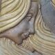 Bas relief en pierre style Art Déco, femme cheveux au vent