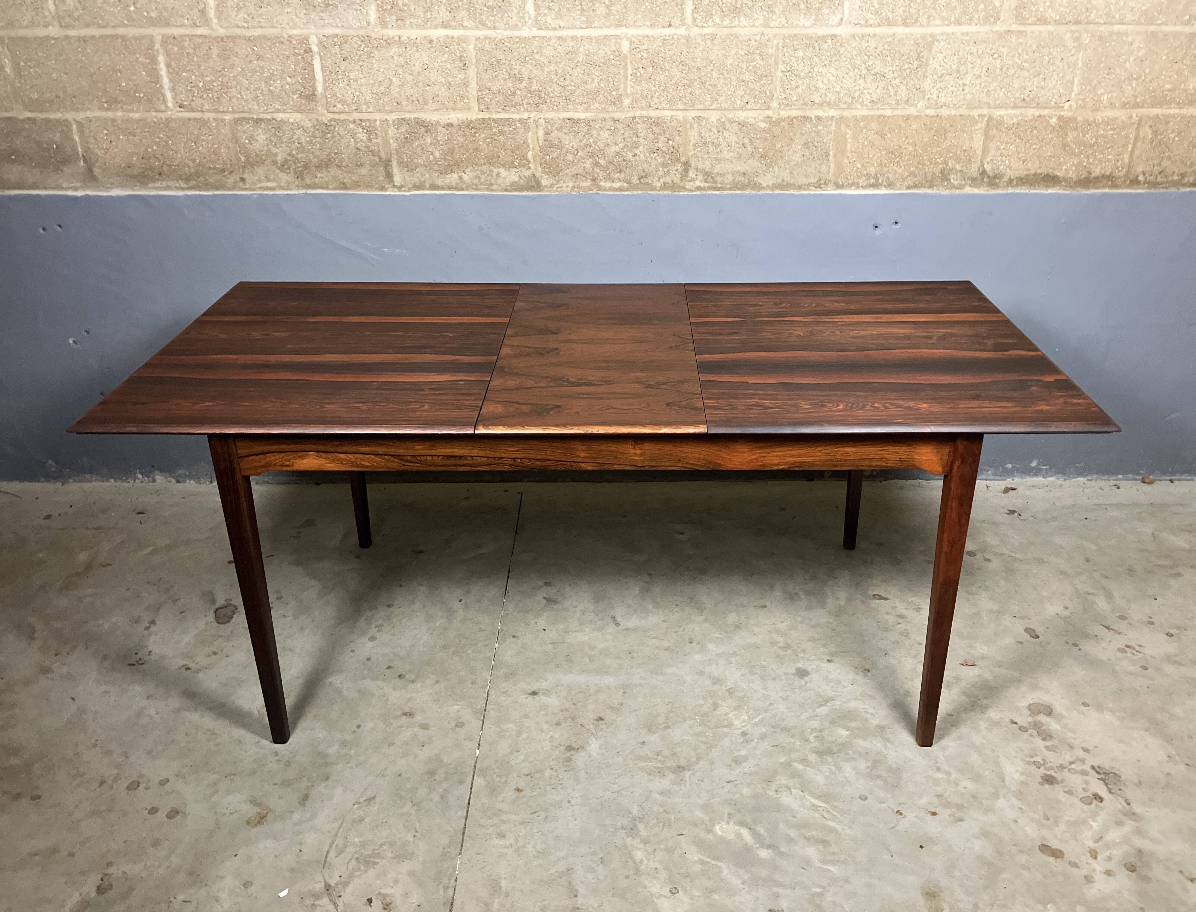 Mid-century rosewood extendable dining table