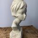Plaster bust of a young girl