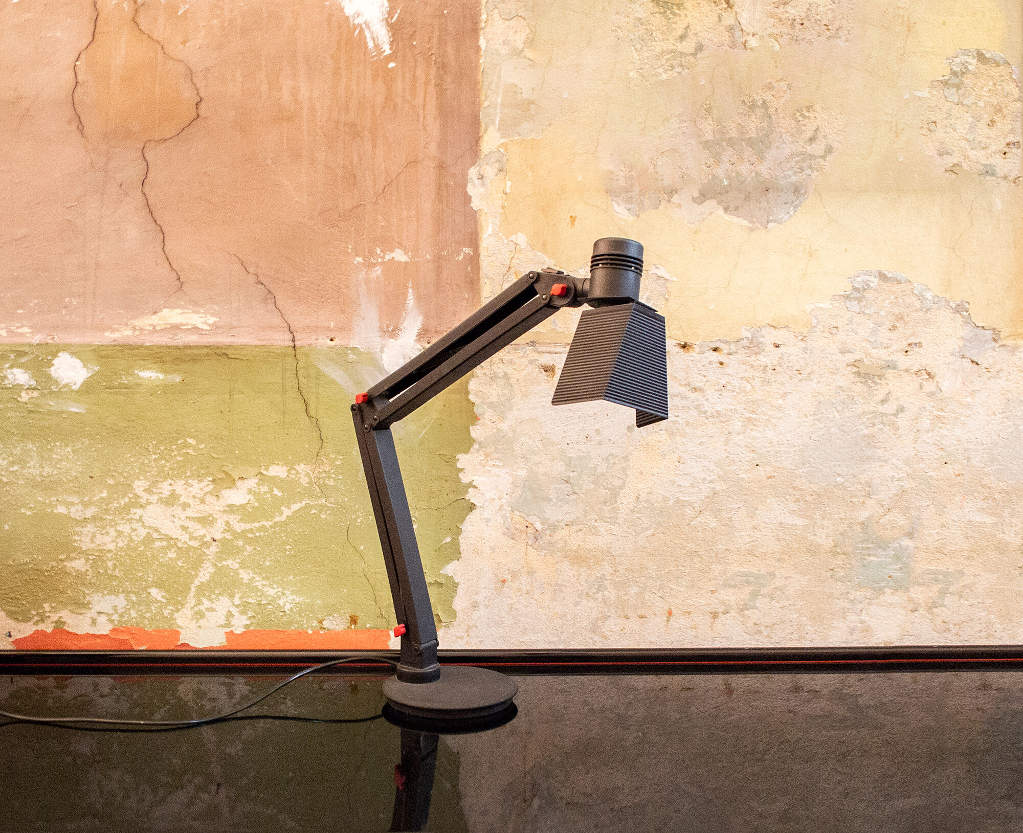 Desk lamp with metal frame and plastic details. Designer C.V.B. 80s