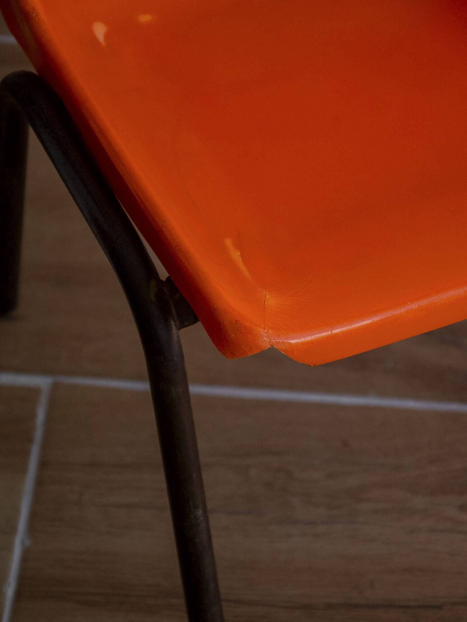 Vintage orange children's chair from the seventies.