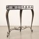 Old iron console painted with tin decorations, 20th century.