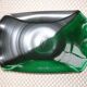 Green and black ceramic cup moist from the 1960s