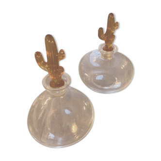 Glass bottles with yellow cactus caps