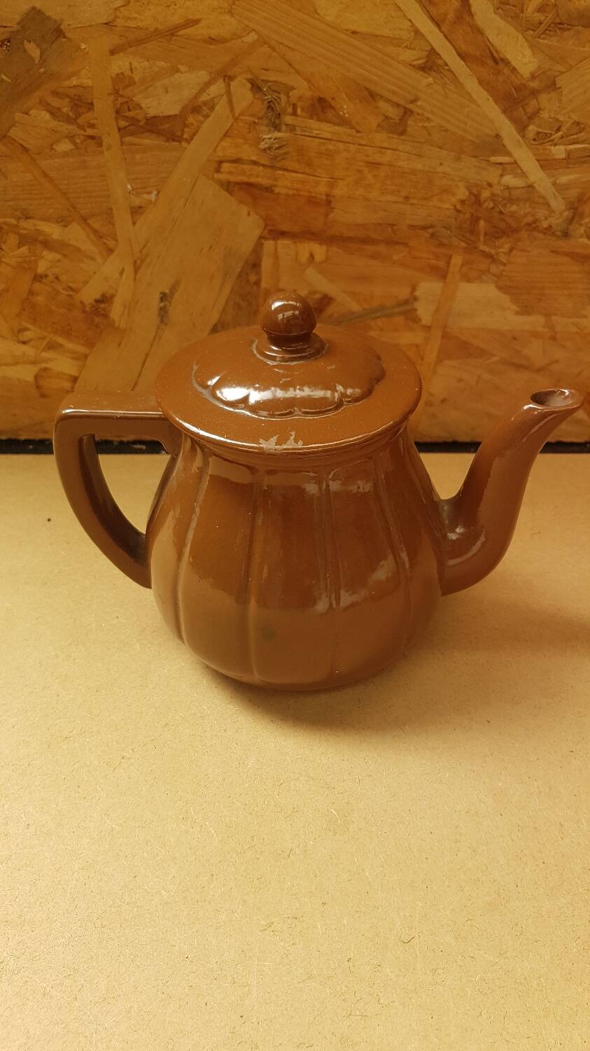 Old vintage brown ceramic romeo teapot