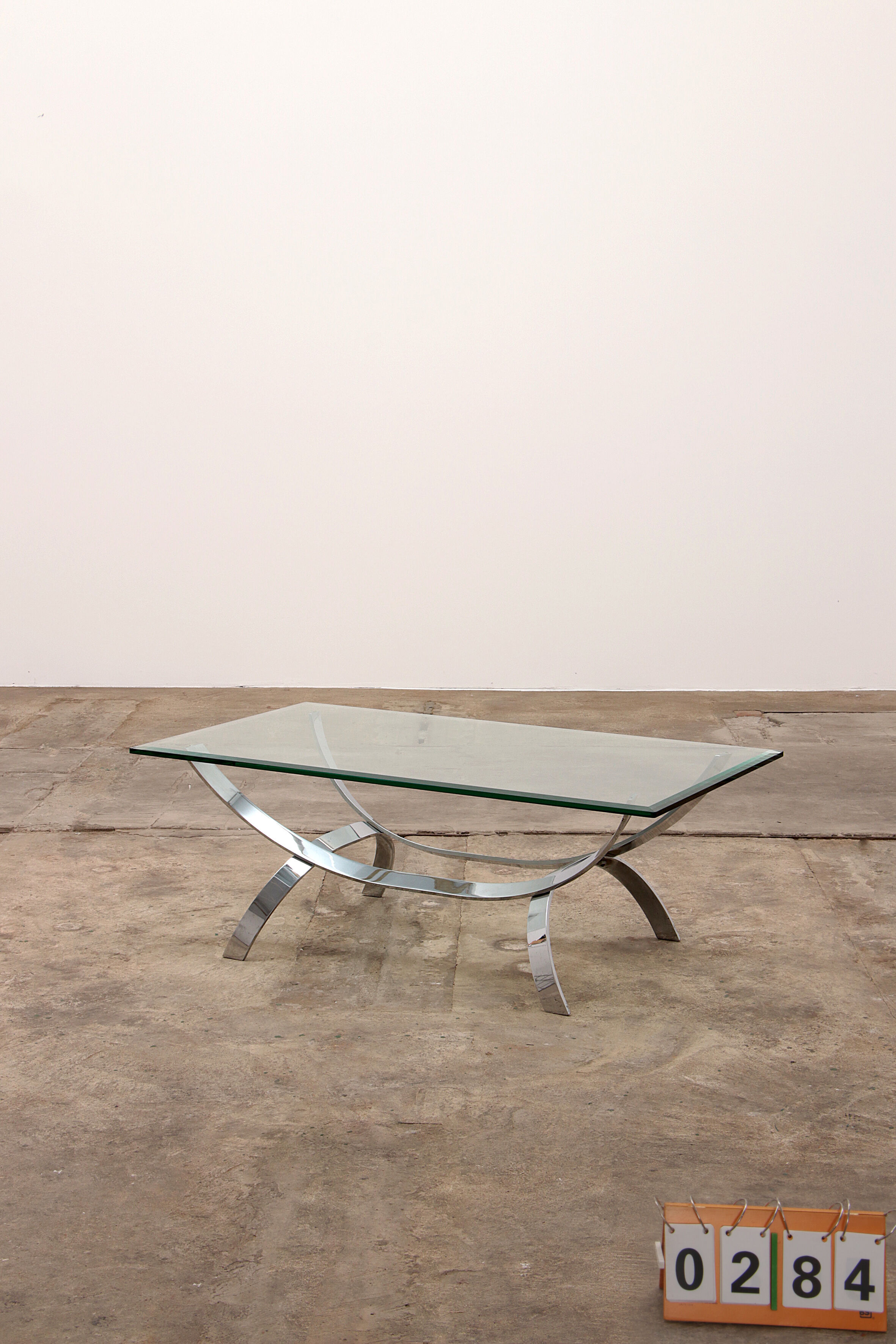 Space age chrome coffee table with thick glass top 1970