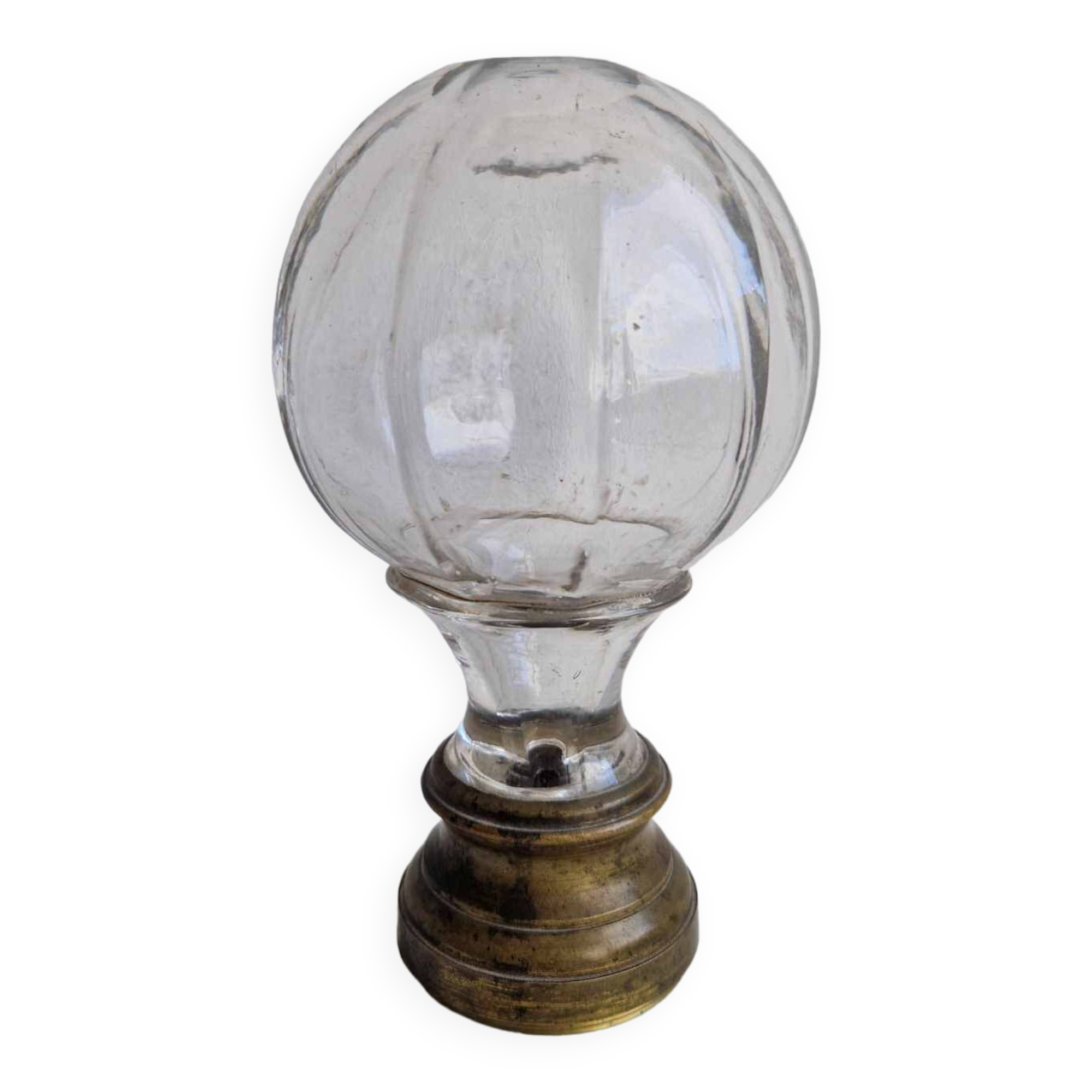 Glass and brass stair ball