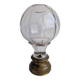 Glass and brass stair ball