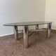 Table basse métal chromé verre fumé années 70