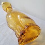 Zoomorphic carafe in amber glass