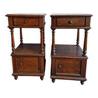 Pair of antique wooden bedside tables with marble tops