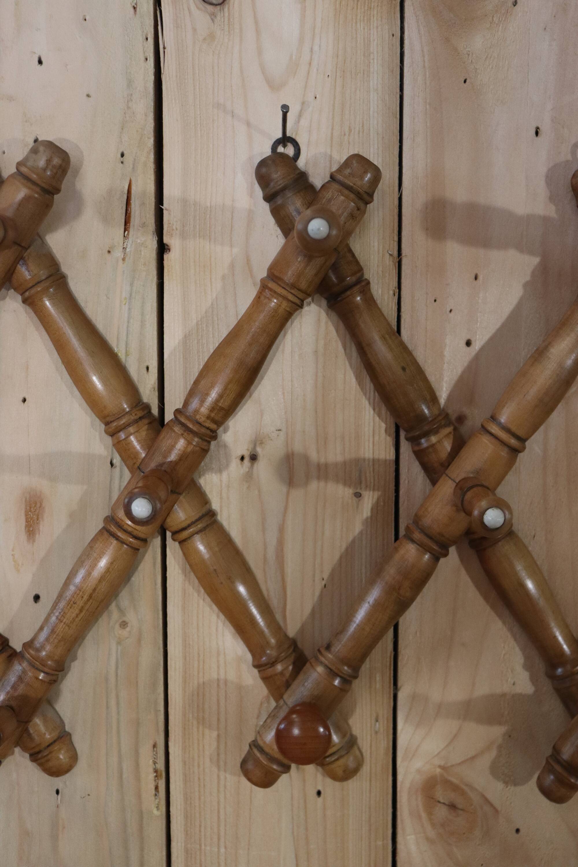 Old turned wooden wall coat rack