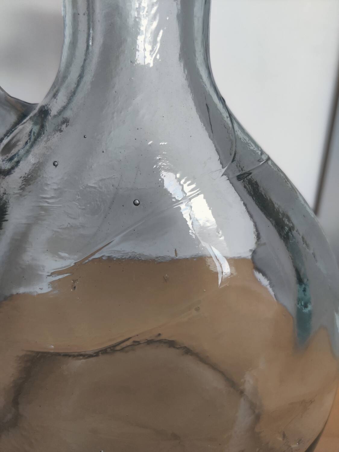 Antique carafe made of thick glass