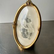Art nouveau oval frame gilded wood measurements 19 cm x 11.5 cm  convex glass