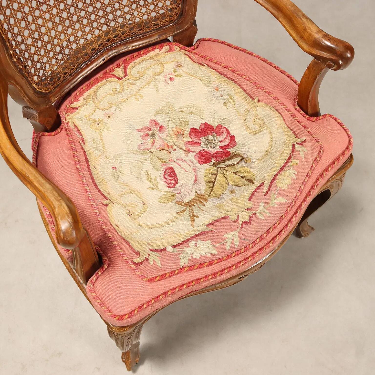 Antique baroque-style armchairs in walnut and fabric, 19th century.