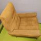 Old velvet heating chair on metal legs